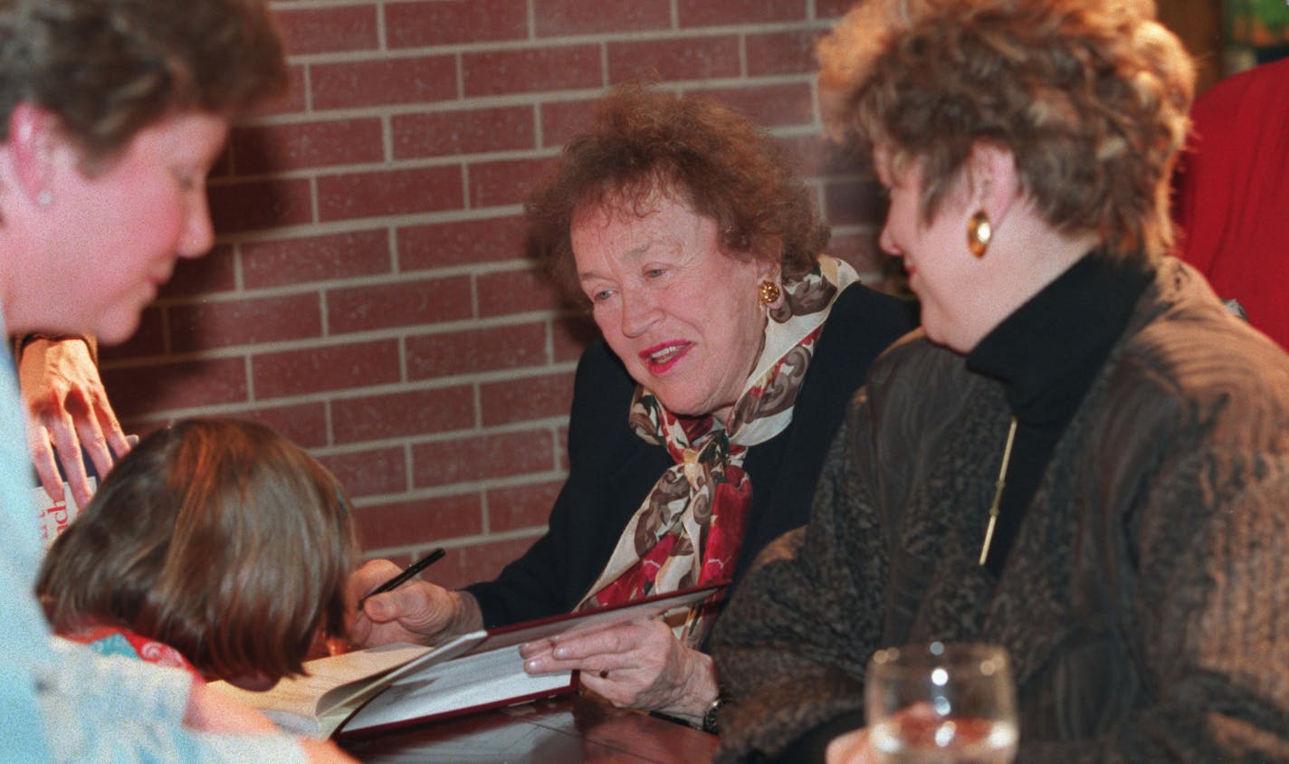 Julia Child, accompanied by Minnesota's own Lynne Rossetto Kasper, signed copies of her latest book, "In Julia's Kitchen With Master Chefs," at Dayton's in 1995.