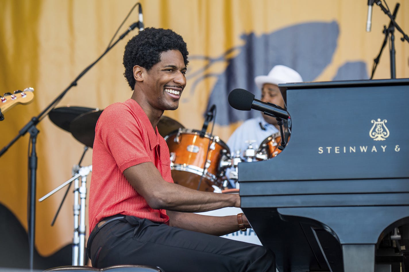 Jon Batiste performs during the Tribute to Fats Domino at the New Orleans Jazz and Heritage Festival on Saturday, April 28, 2018, in New Orleans. (Photo by Amy Harris/Invision/AP)