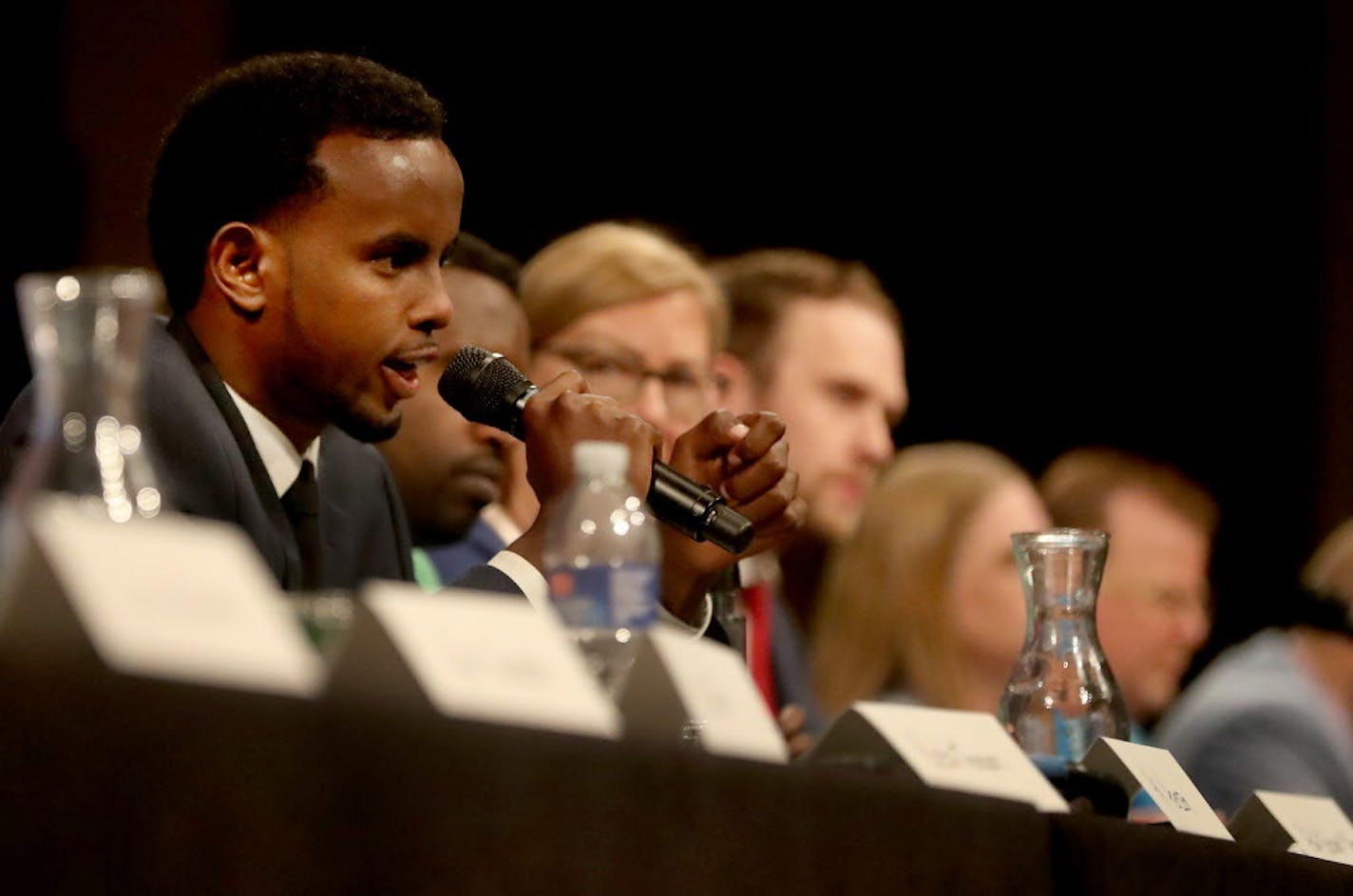 Minneapolis Park Board District 3 candidate AK Hassan, left, was among the candidates participating in a pre-event forum at the DFL convention Saturday, July 8, 2017, at the Minneapolis Convention Center in Minneapolis.