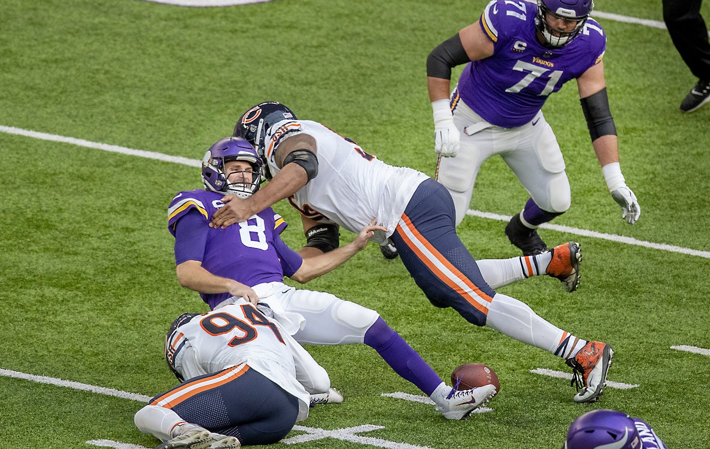 Vikings quarterback Kirk Cousins is sacked and fumbled the ball but was recovered by Vikings offensive tackle Riley Reiff in the second quarter. ] ELIZABETH FLORES • liz.flores@startribune.com