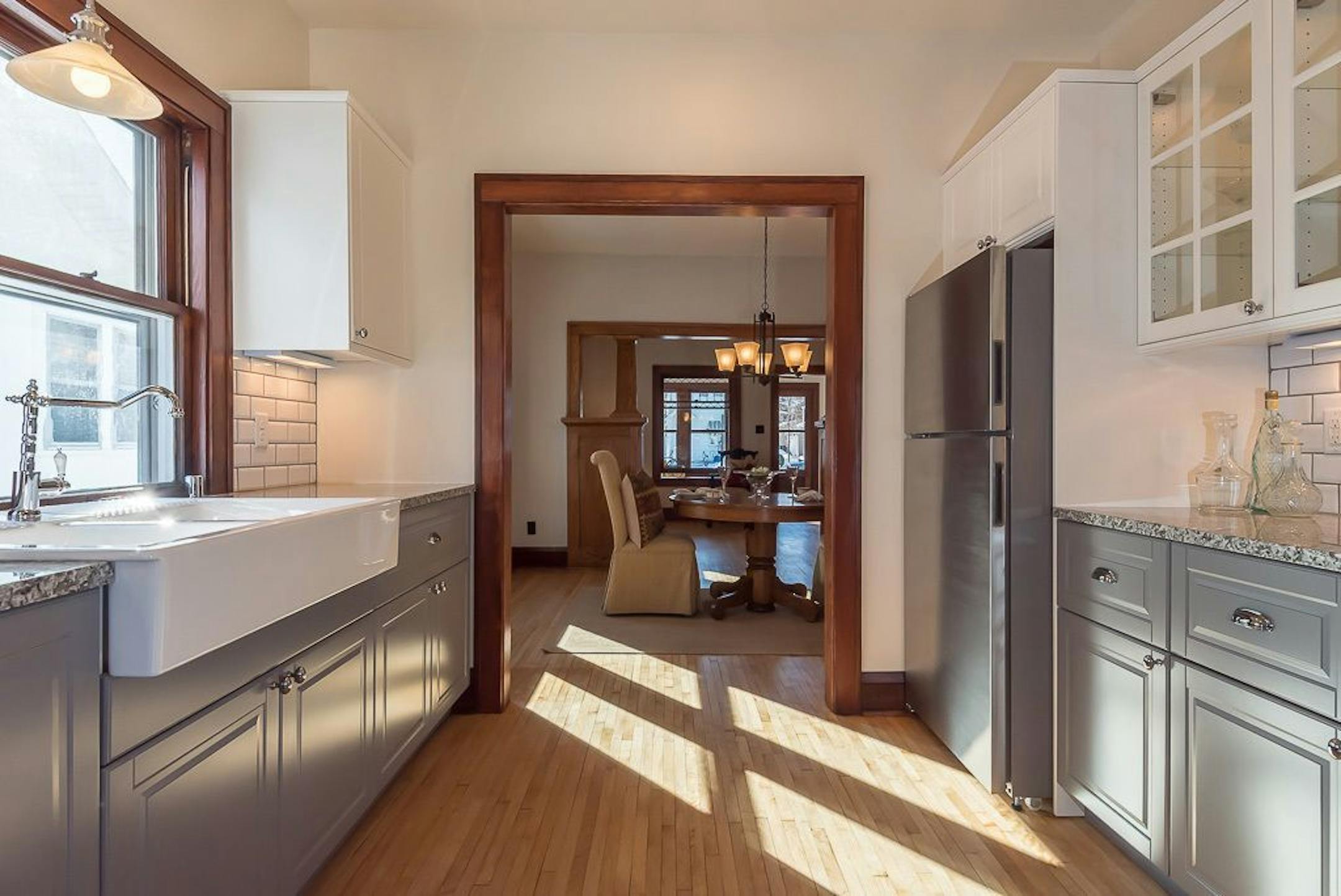 The doorway between the kitchen and dining room was widened, for better flow.