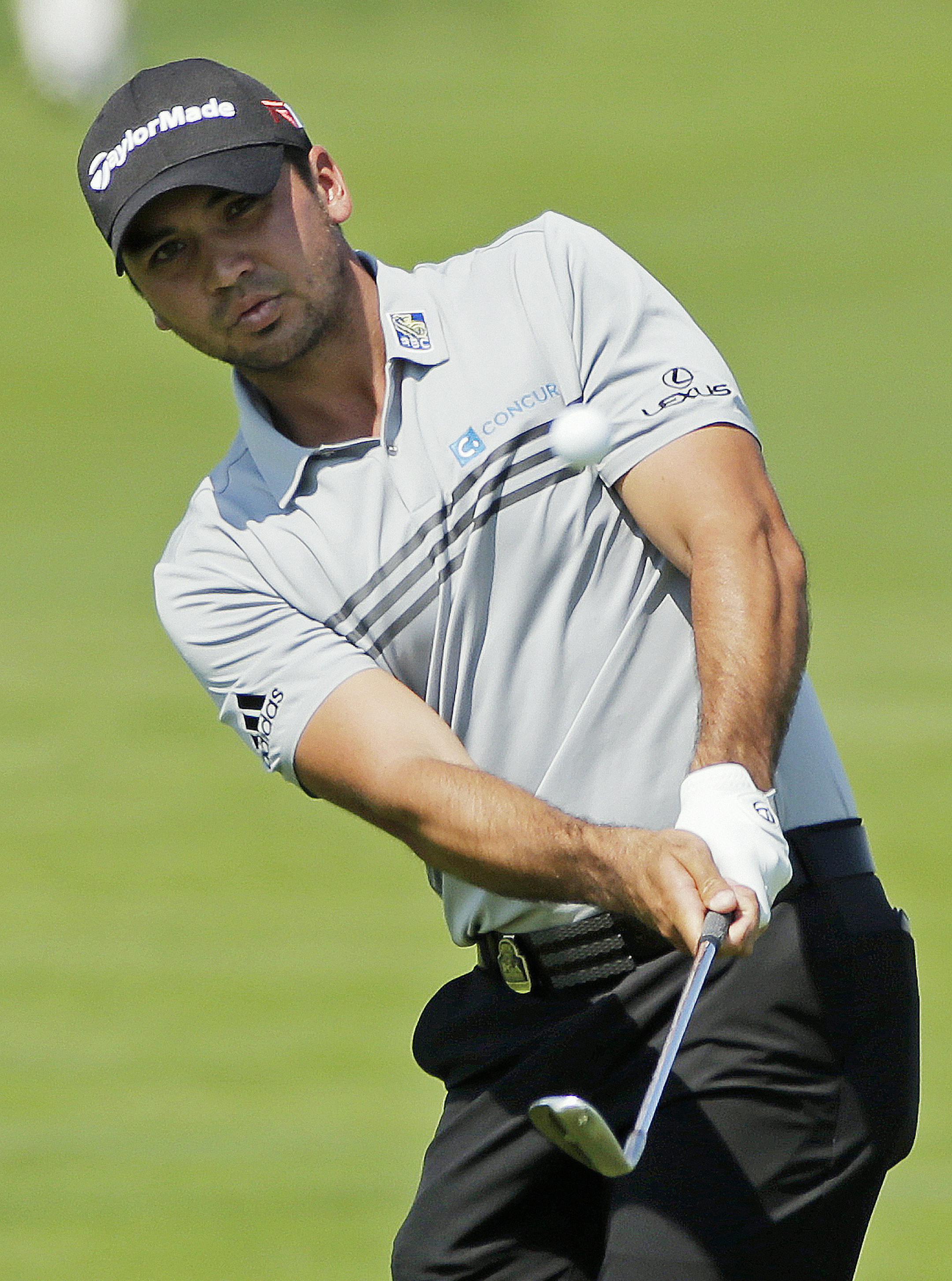 Jason Day, of Australia, hits on the second hole during the second round of the PGA Championship golf tournament Friday, Aug. 14, 2015, at Whistling Straits in Haven, Wis. (AP Photo/Jae Hong)