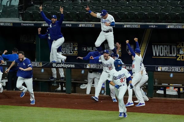 Los Angeles Dodgers celebrate after winning the 22020 World Series.