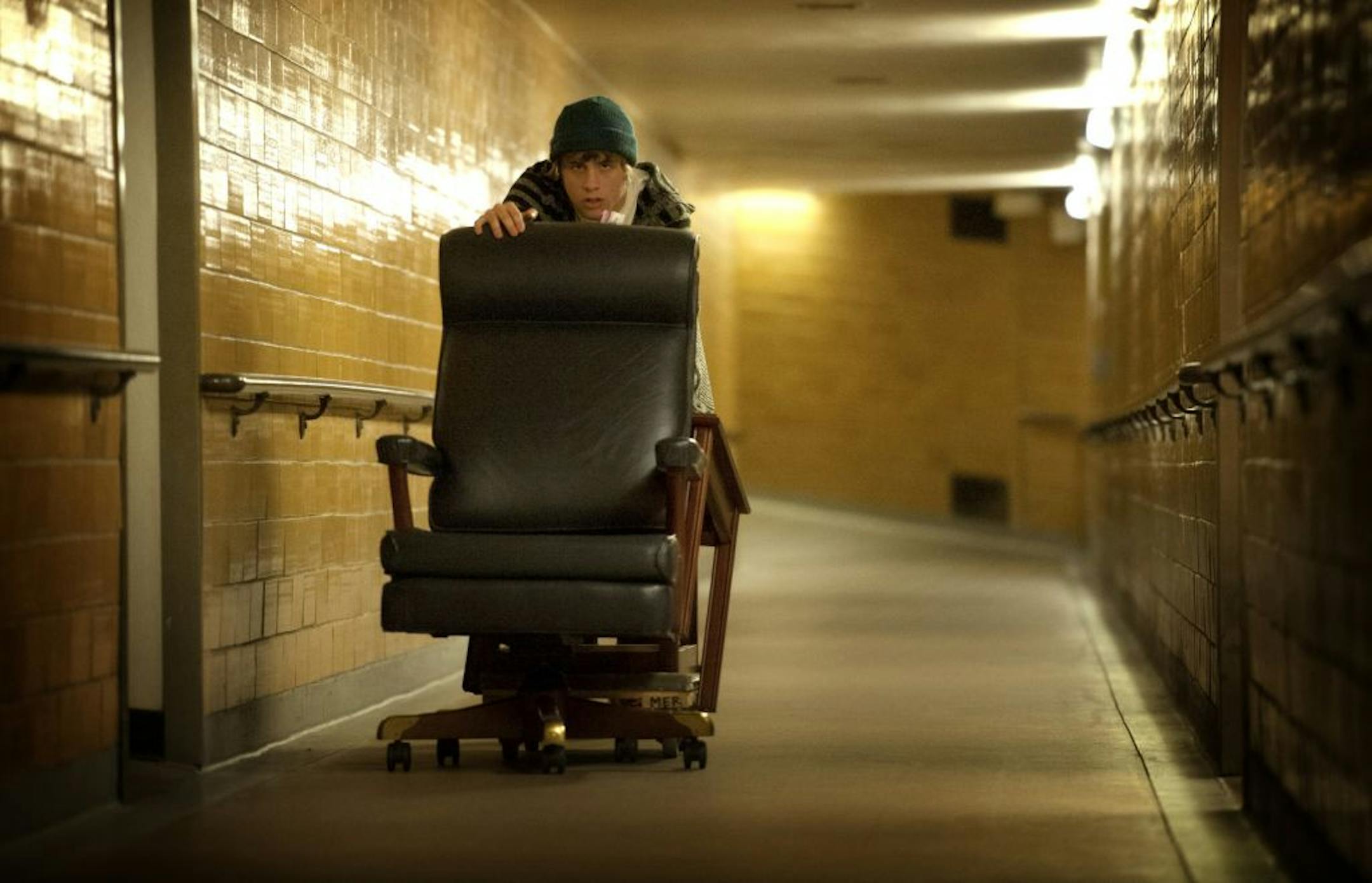 Dan Roth with the Senate Sergeant at Arms office pushed a load of chairs from the State Office Building to the Capitol on Monday.