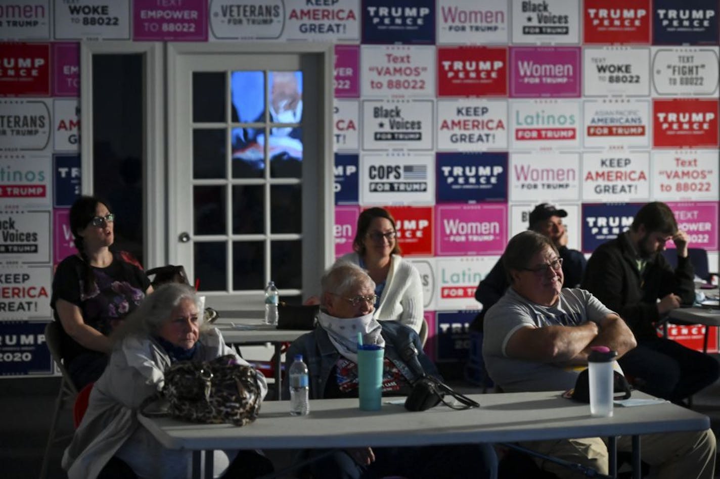 Attendees watched the first US presidential debate Tuesday night at the Eagan Trump Victory Headquarters Tuesday's night.