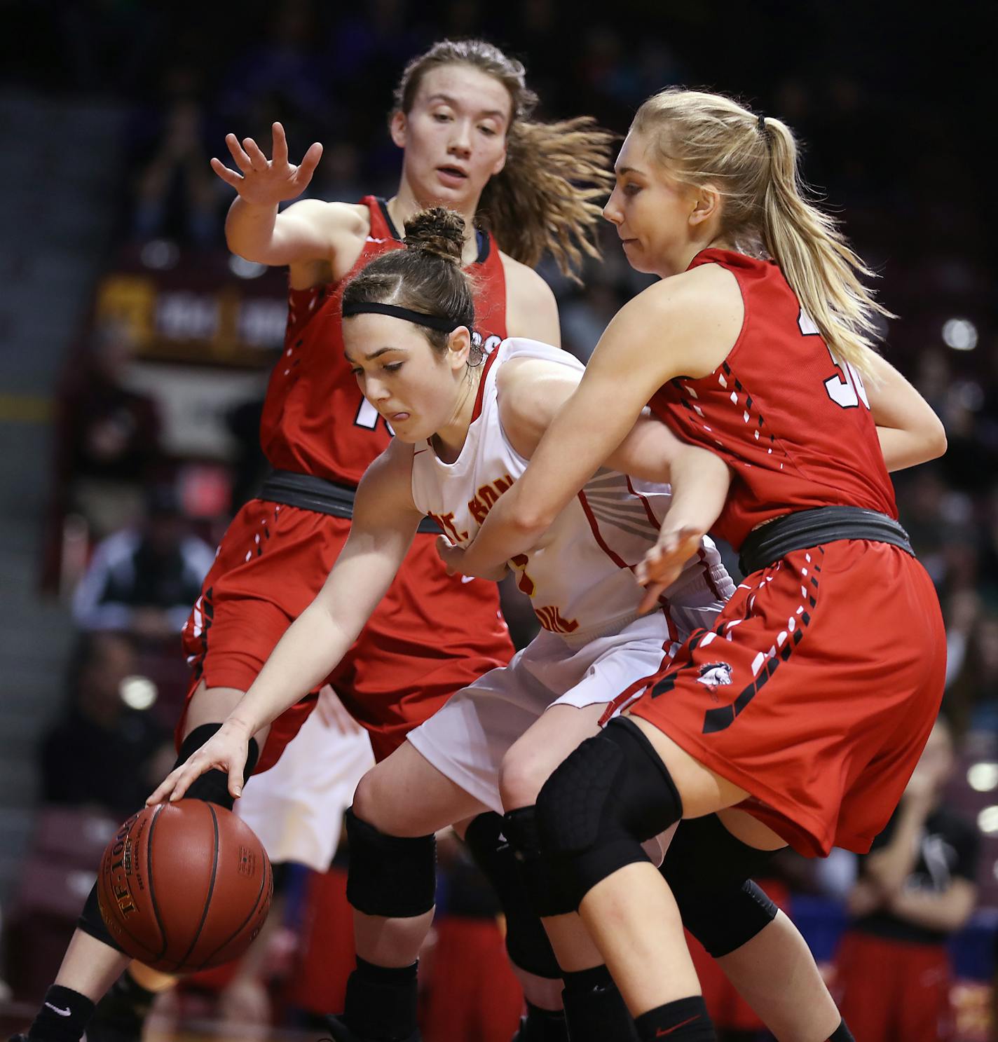 Mya Buffetta of Mountain Iron-Buhl, center, is double teamed by Sami Payne, left, and Sophia Montgomery of Maranatha Christian. ] LEILA NAVIDI &#xef; leila.navidi@startribune.com BACKGROUND INFORMATION: Maranatha Christian Academy plays against Mountain Iron-Buhl in the semifinal of the girls class A basketball tournament at Williams Arena in Minneapolis on Friday, March 17, 2017.