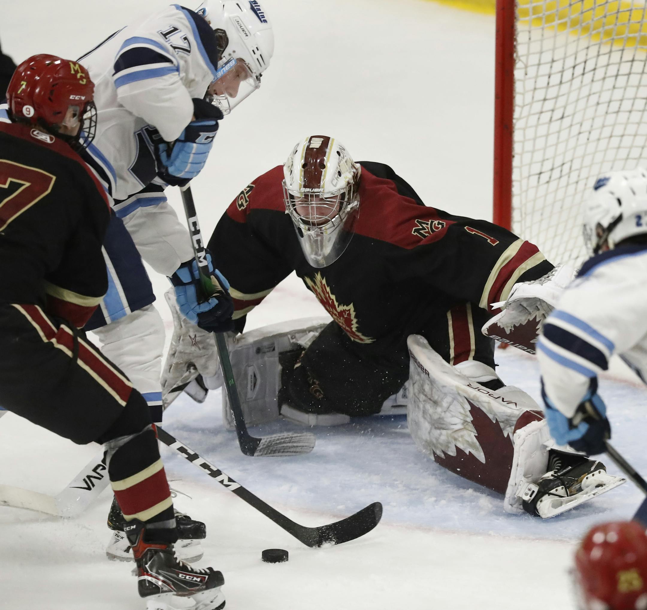 Maple Grove goalie Jack Wienke (1) successfully defended a shutout against Blaine including an attempt by Blaine's Carsen Richels (17).] boys' hockey, Class 2A, Section 5 final, Blaine vs. Maple GroveIRICHARD TSONG-TAATARII ¥ richard.tsong-taatarii@startribune.com