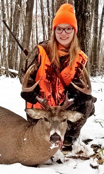 Kaitlyn Tripp, 15, of St. Michael, shot her first deer at 8:30 on opening morning on private land south of Detroit Lakes. She made a standing free-han