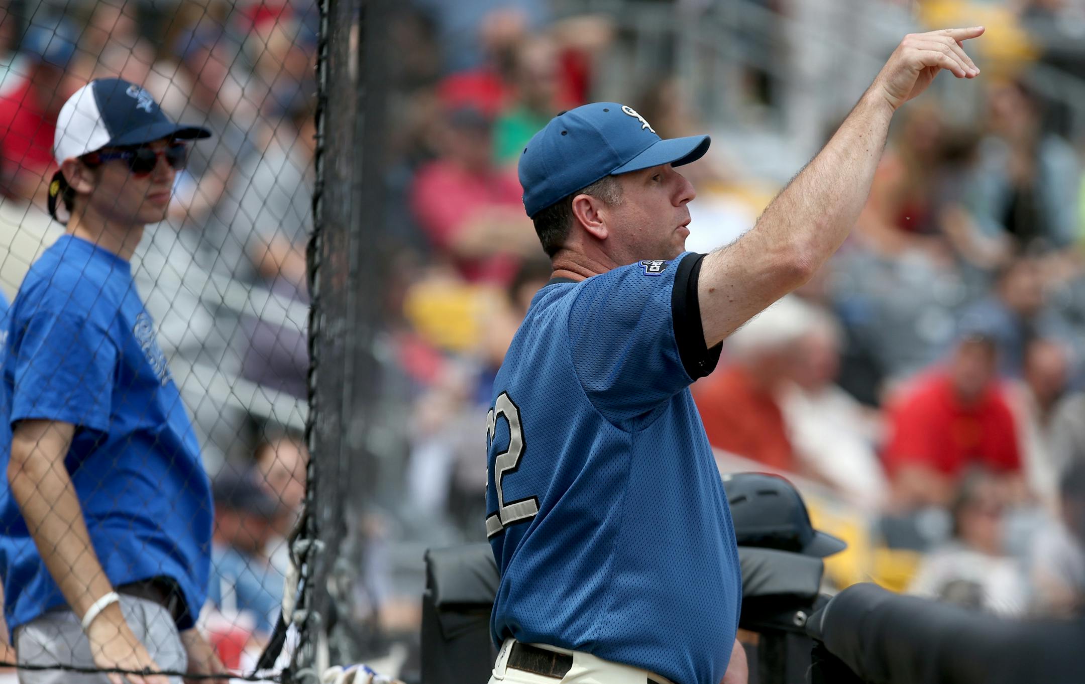 The Saints manager George Tsamis gave instructions to the infield as they played the Sioux City Explorers.