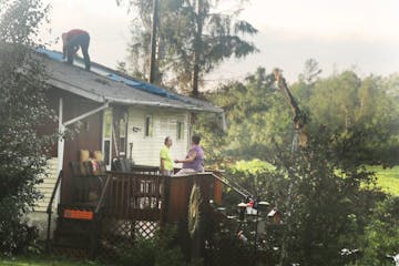 A home in Barron, Wis., and the surrounding trees were damaged after a strong afternoon thunderstorm moved through the area Friday.