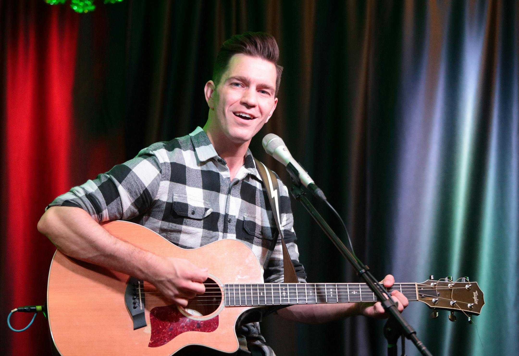 Singer-songwriter Andy Grammer visits the Mix 106.1 Performance Theater on Tuesday, March 17, 2015, in Philadelphia. (Photo by Owen Sweeney/Invision/AP)