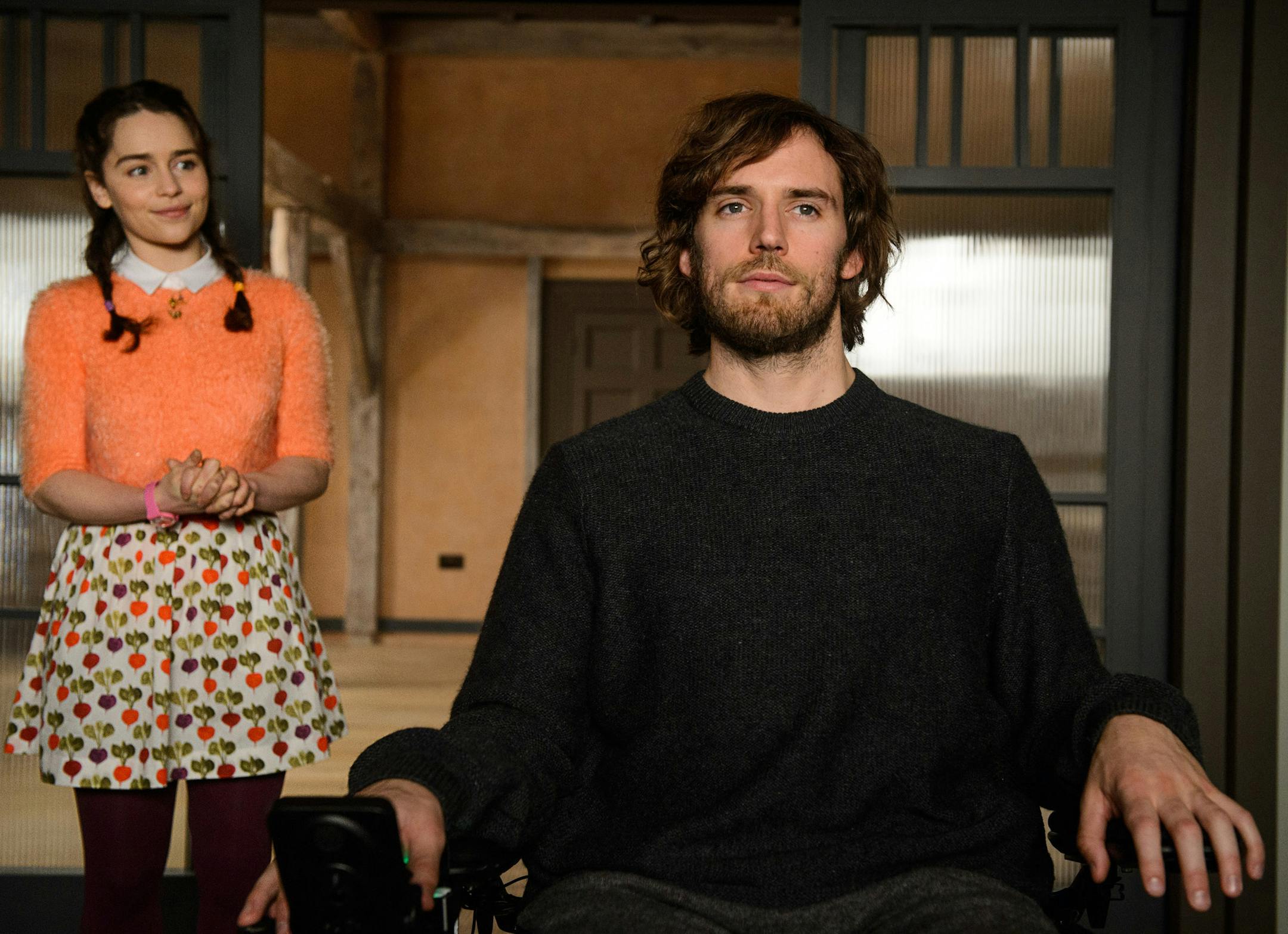 This image released by Warner Bros. Entertainment shows Emilia Clarke, left, and Sam Claflin in a scene from "Me Before You." (Alex Bailey/Warner Bros. Entertainment via AP)
