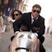 This image released by Sony Pictures shows Chris Hemsworth, foreground, and Tessa Thompson in a scene from Columbia Pictures' "Men in Black: Internati