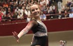 North Branch's Dakota Esget competed in floor exercise Saturday on her way to a state championship.