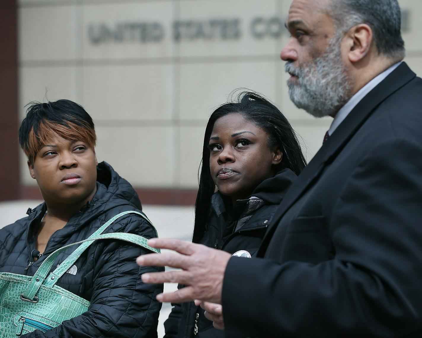 Jamar Clark's siblings Sharice Burns, left, and Tiffany Roberson, cq, listened to their attorney Albert Goins as he addressed the media in response to Hennepin County Attorney Mike Freeman's decision not to use a grand jury in the case, Wednesday, March 16, 2016 in Minneapolis, MN. ] (ELIZABETH FLORES/STAR TRIBUNE) ELIZABETH FLORES &#x2022; eflores@startribune.com