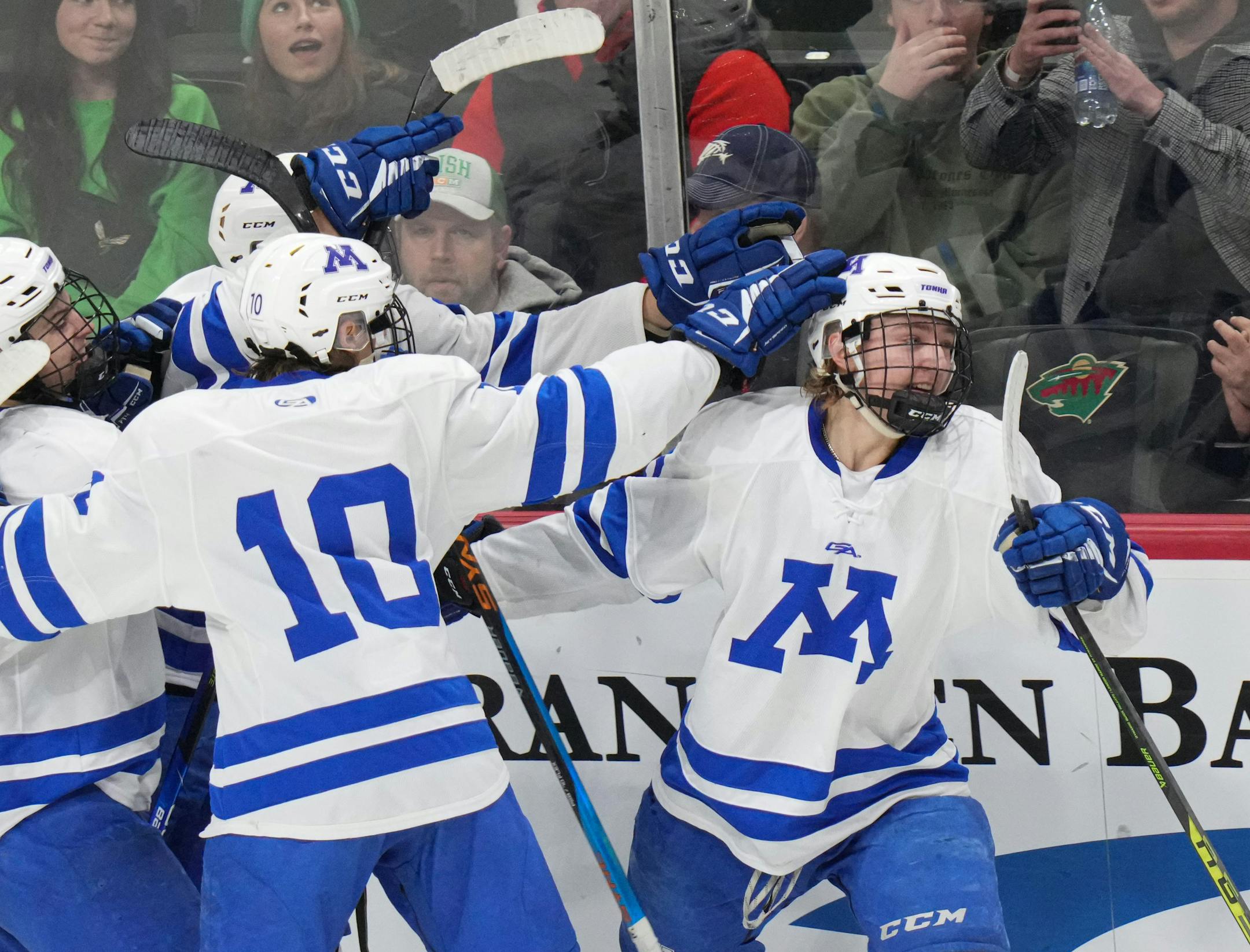Minnetonka forward Ashton Schultz (11), right scored the games winning goal against Edina in the third period.
