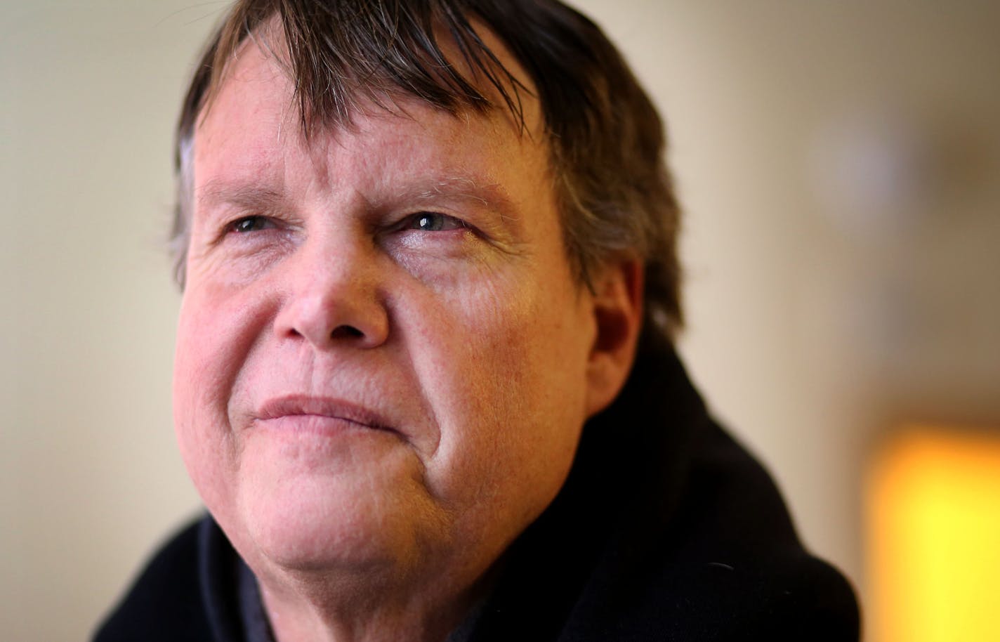 Brad Teslow, a former gym teacher, pauses at his apartment before heading to work Wednesday, Feb. 27, 2016, in St. Paul, MN. ](DAVID JOLES/STARTRIBUNE)djoles@startribune.com Brad Teslow will be preparing for work at a sheltered workshop. He will be leaving his downtown apartment in St. Paul at 3 p.m., and then driving to Bloomington, where he works on an assembly line in a warehouse operated by Opportunity Partners**Brad Teslow,cq