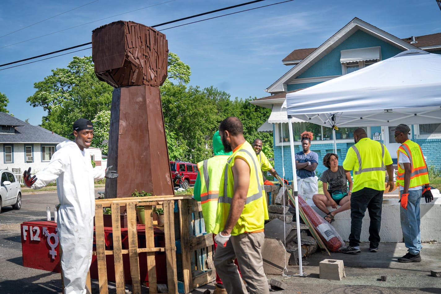 A crew from Agape arrived at George Floyd Square and attempted to remove shipping pallets placed on 38th St to block traffic. They argued with people at the outpost and left quickly after removing a few pallets. Leaving piles of broken concrete where they were.