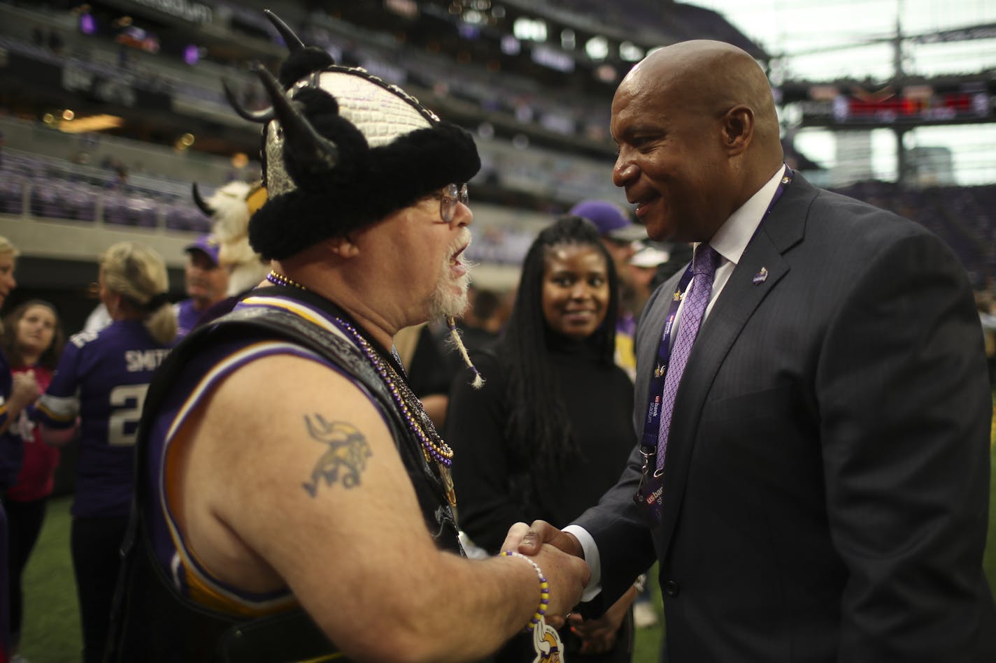 Kevin Warren, the Vikings' chief operating officer, was greeted warmly by Gary Lodoen of Eden Prairie — a k a Sir Purple Heart — before a Vikings-Lions game at U.S. Bank Stadium.