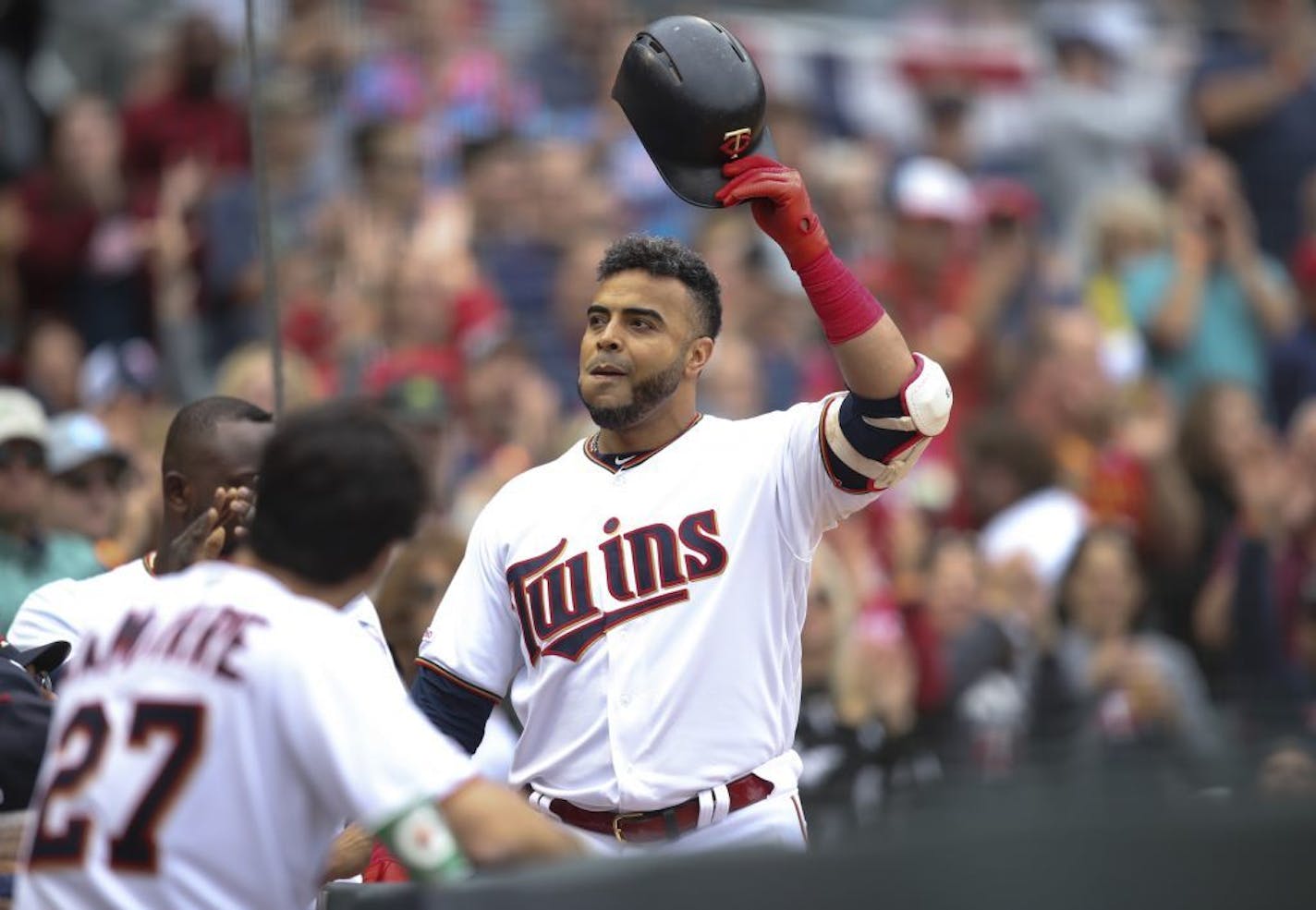 The Twins' Nelson Cruz acknowledged the cheering crowd as he celebrated his 40th home run of the season, and his 400th career homer, a 412 foot solo shot to right field in the fourth inning.