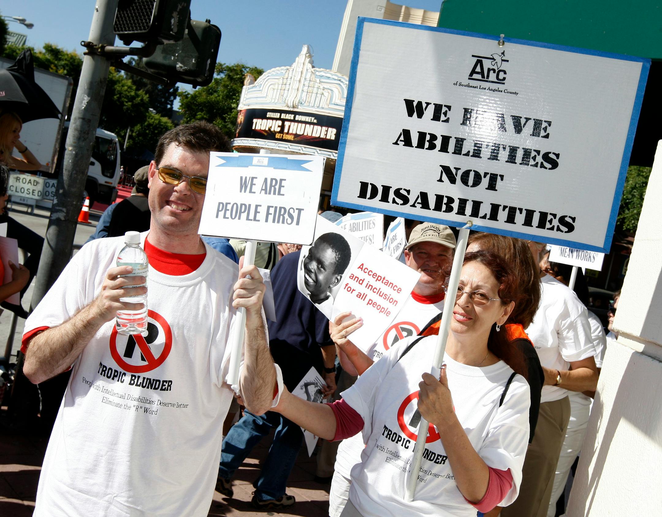 Protesters in Los Angeles held signs criticizing the upcoming film "Tropic Thunder": Quality films aren't made at the expense of vulnerable people.
