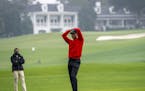 Tiger Woods reacts to a missed shot on the second hole during the final round at the Masters Tournament in Augusta, Ga., Nov, 15, 2020. After a horrif