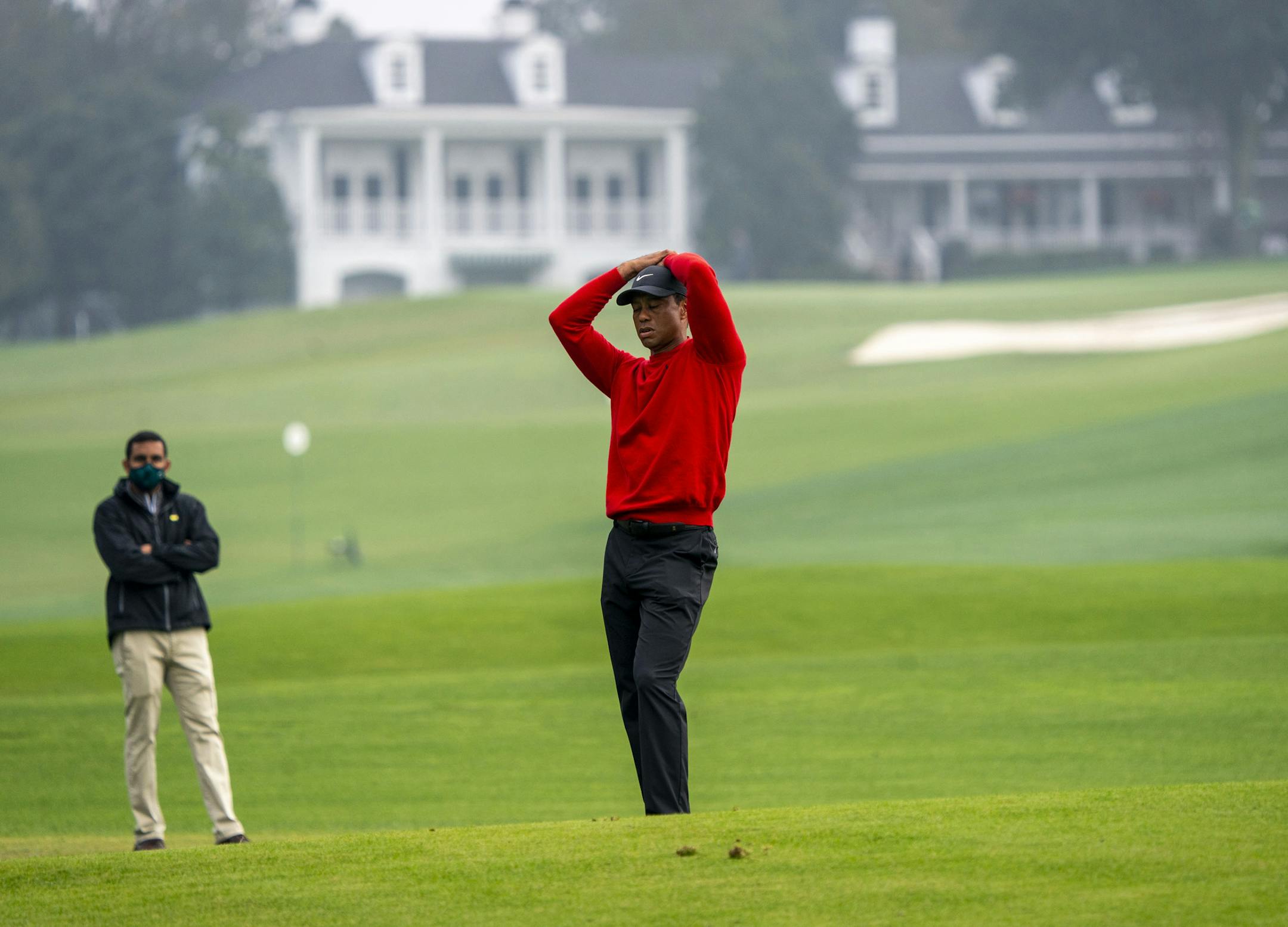 Tiger Woods reacts to a missed shot on the second hole during the final round at the Masters Tournament in Augusta, Ga., Nov, 15, 2020. After a horrific appearance at No. 12, the five-time Masters winner did not fade Ñ even with no hope of another green jacket and almost no one around to watch. (Doug Mills/The New York Times)