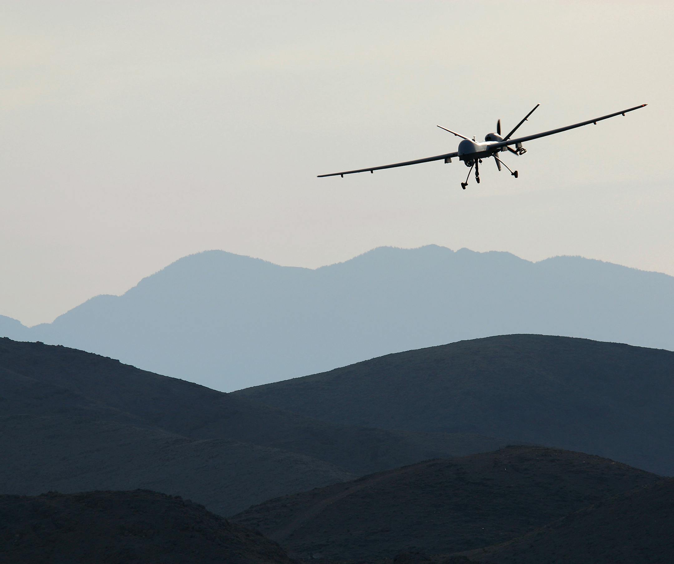 A Reaper drone aircraft comes in for a landing at Creech Air Force Base in Nevada during a training program to bring more pilots online for an expanded use of drones in the skies over Iraq and Afghanistan as well as for missions elsewhere around the world. (Rick Loomis/Los Angeles Times/TNS) ORG XMIT: 1169840