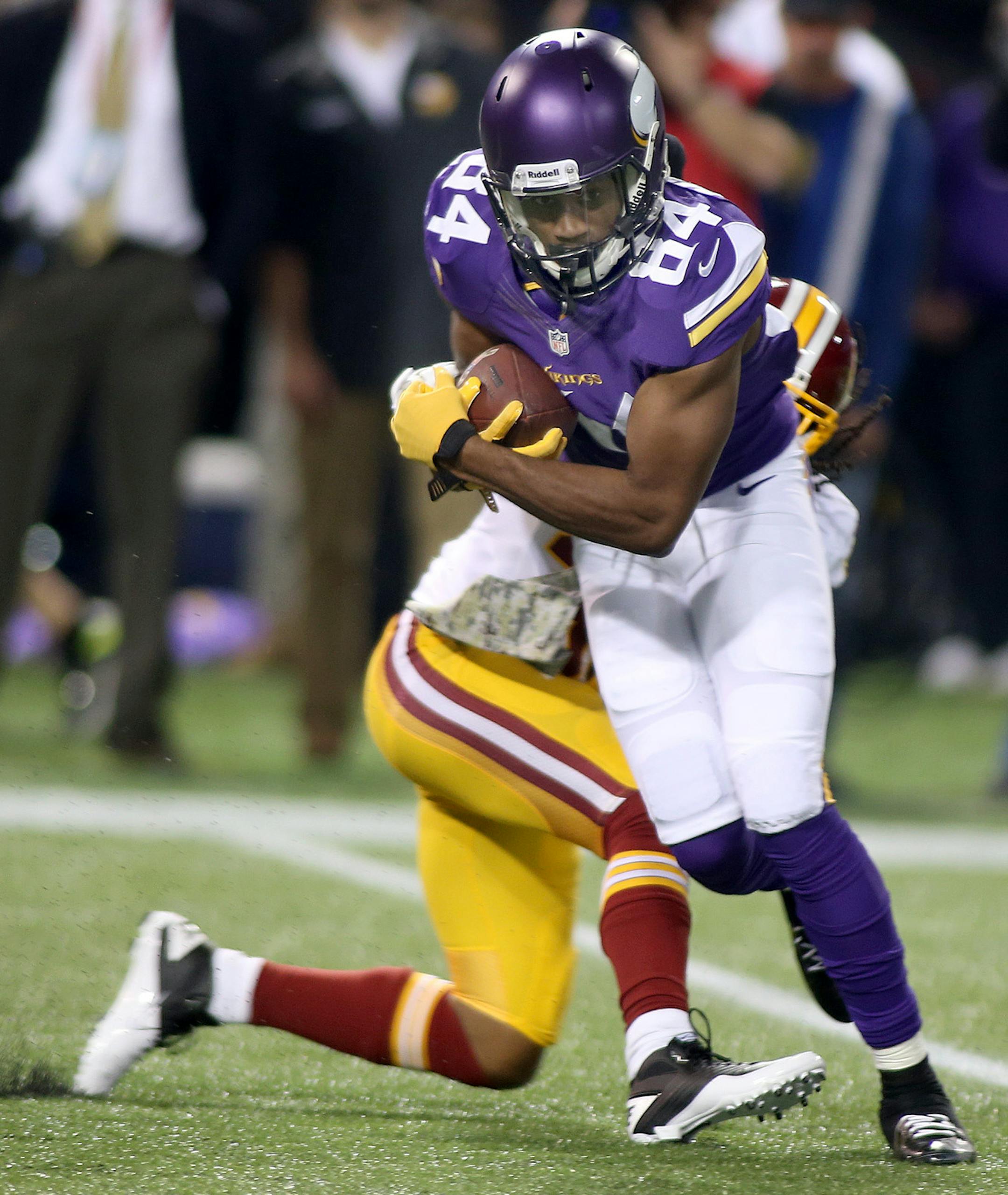 Minnesota Vikings wide receiver Cordarrelle Patterson (84) was stopped by Washington Redskins strong safety Brandon Meriweather (31) during the second quarter as the Vikings took on the Washington Redskins, Thursday, November 7, 2013 at Mall of America Field in Minneapolis, MN. (ELIZABETH FLORES/STAR TRIBUNE) ELIZABETH FLORES • eflores@startribune.com ORG XMIT: MIN1311072256539166