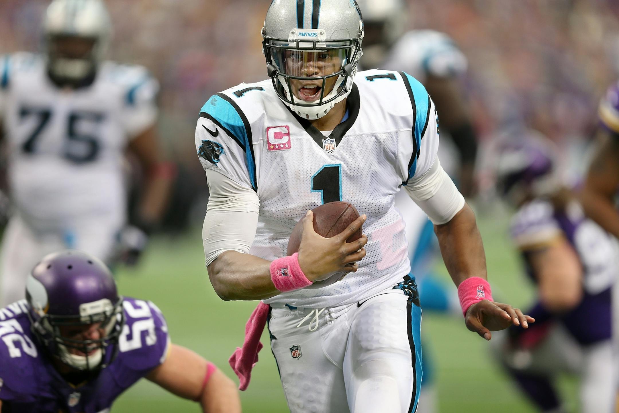Carolina Panthers quarterback Cam Newton (1) ran seven yards for a touchdown in the third quarter as the Vikings took on the Carolina Panthers at Mall of America Field, Sunday, October 13, 2013 in Minneapolis, MN. The Vikings lost 35-10. (ELIZABETH FLORES/STAR TRIBUNE) ELIZABETH FLORES � eflores@startribune.com