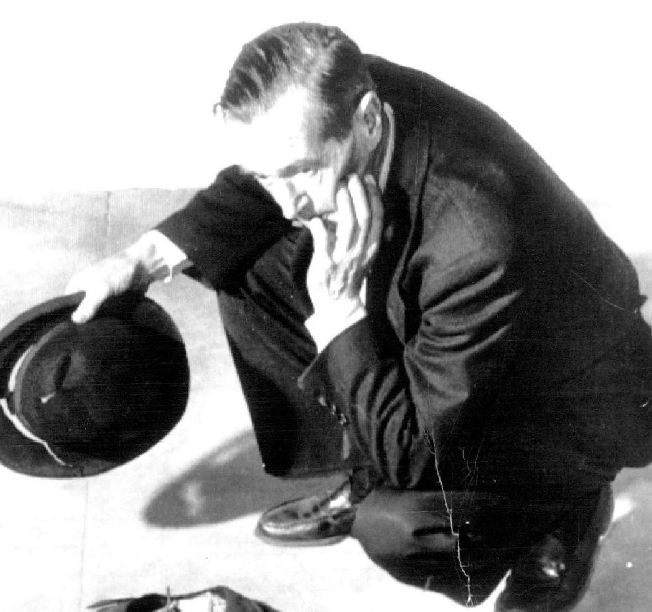 January 22, 1954 CLOTHES OF THE PAST - Rollie Totheroh, cameraman for Charlie Chaplin for 38 years, looks over the original clothes worn by the famous comedian in "The Kid," released in 1921. Now that Chaplin has sold his Hollywood studio, Totheroh is taking to Chaplin in England these clothes and other personal things left at the studio by the actor. Totheroh says Chaplin has a story ready for filming and he will again be his cameraman. February 2, 1954 AP Wirephoto