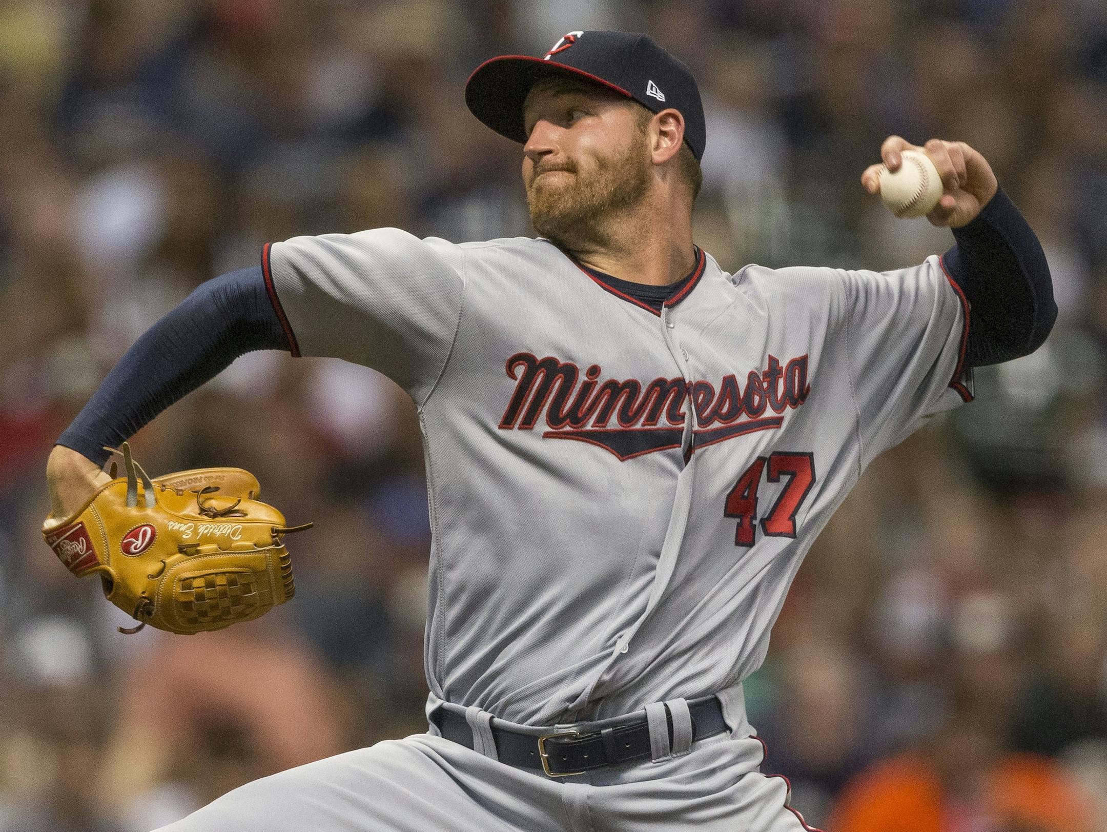 Minnesota Twins' Deietrich Enns pitches to a Milwaukee Brewers batter during the first inning of a baseball game Thursday, Aug. 10, 2017, in Milwaukee. (AP Photo/Tom Lynn)
