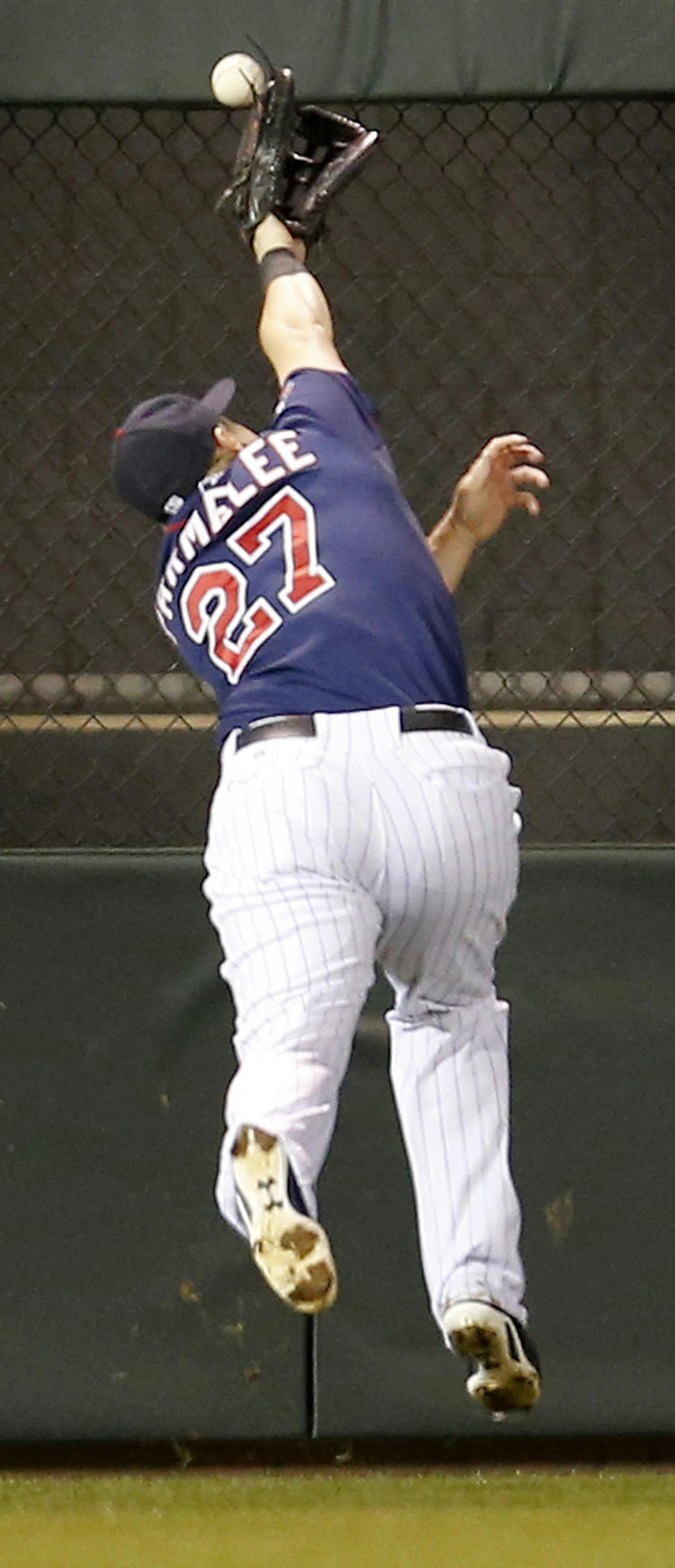 Minnesota Twins left fielder Chris Parmelee (27) could not reach a ball hit by Bryan Holaday in the fourth inning. ] CARLOS GONZALEZ cgonzalez@startribune.com - September 15 , 2014 , Minneapolis, Minn., Target Field, MLB, Minnesota Twins vs. Detroit Tigers