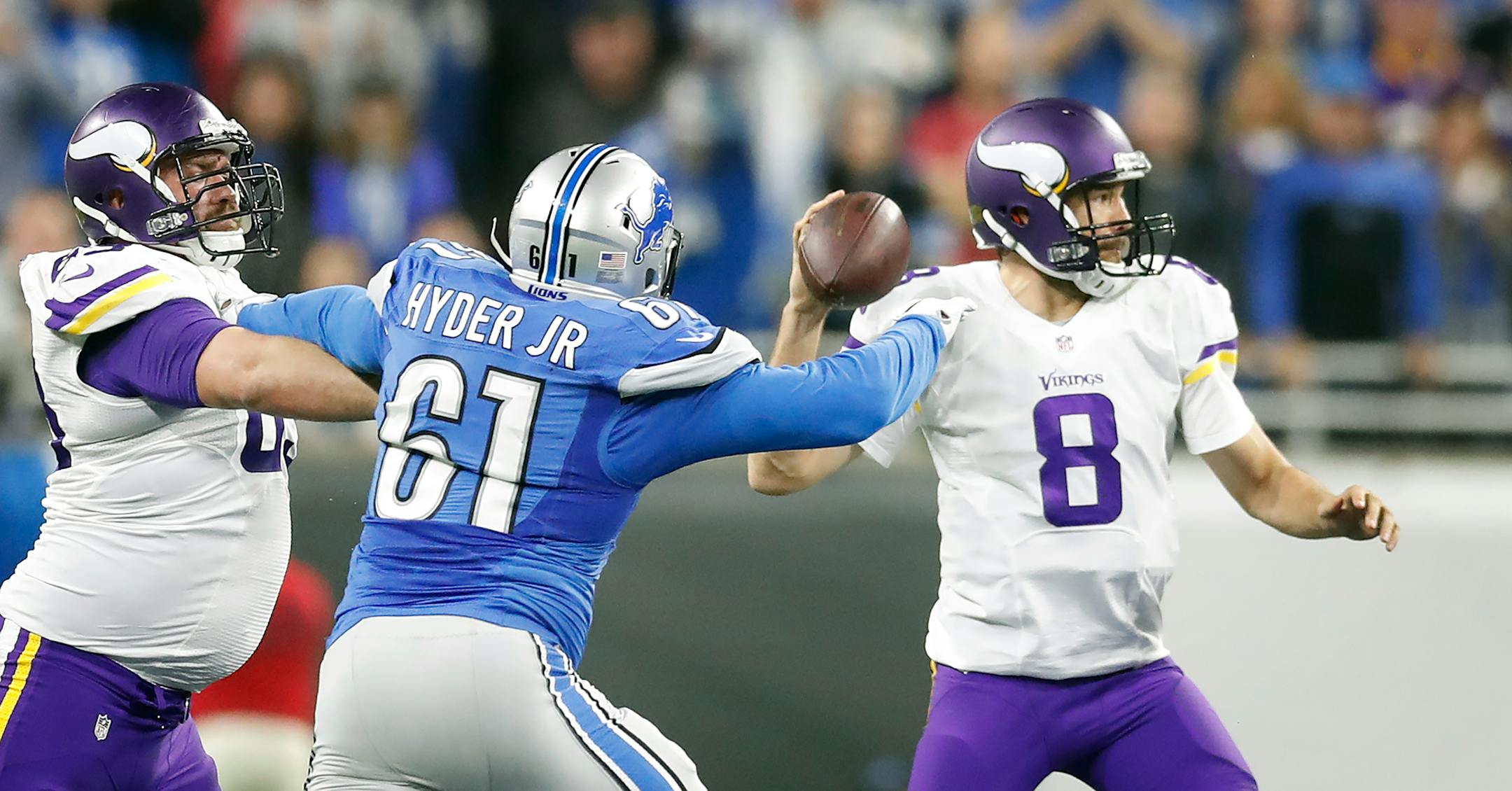 Minnesota Vikings quarterback Sam Bradford (8) was pressured by Detroit Lions defensive end Kerry Hyder (61) in the second quarter at Ford Field Sunday November 24 ,2016 in Detroit MI. ] The Minnesota Vikings played the Detroit Lions at Ford Field on Thanksgiving .Jerry Holt / jerry. Holt@Startribune.com