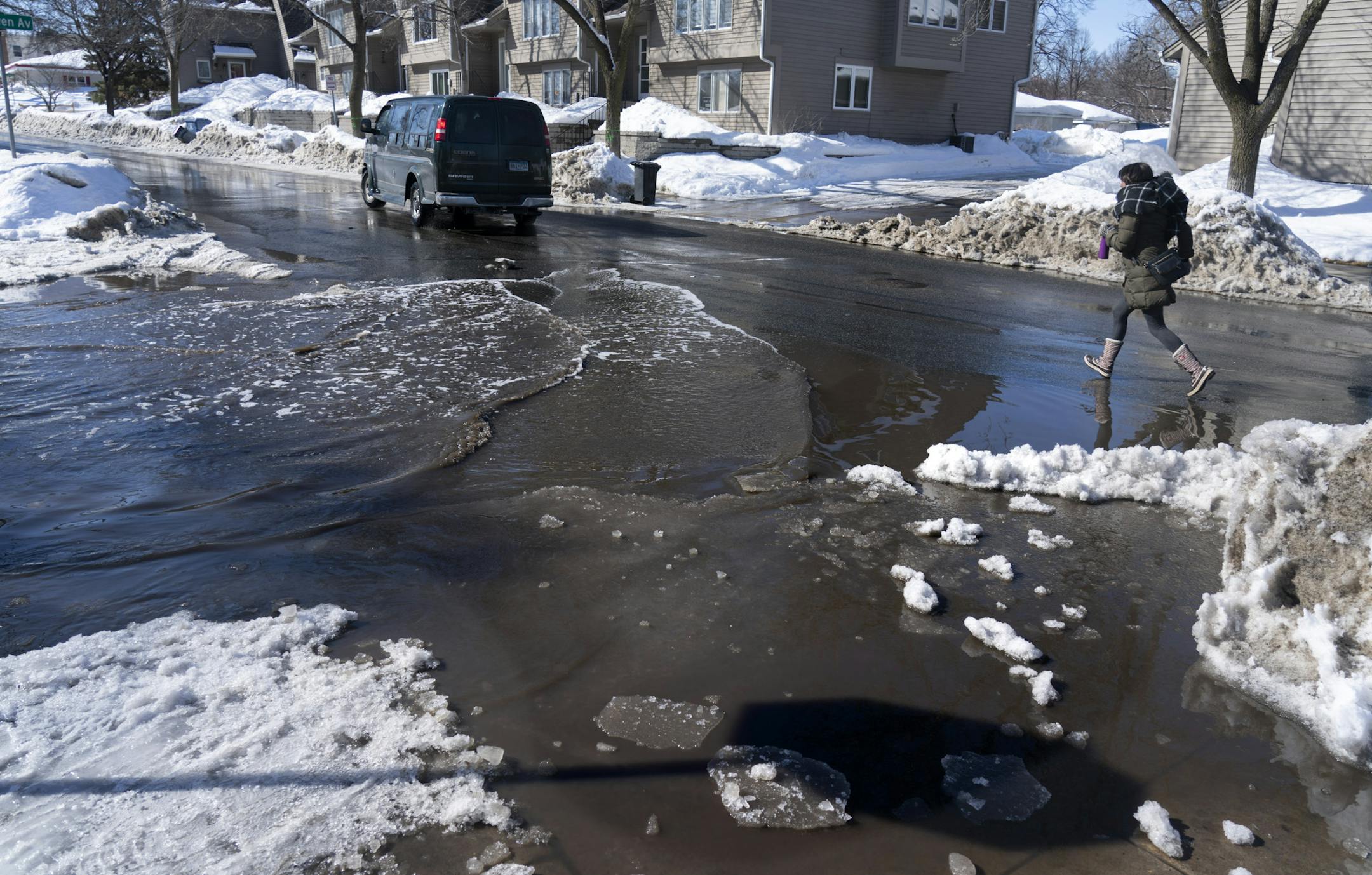 With temperatures rising and the spring sun getting more intense, the weekend snow is turning the streets into rivers with pedestrians having to walk the gauntlet and avoid the land mines. This was the scene along W. 44th St. and S. Chowen Ave. in Minneapolis. ]
brian.peterson@startribune.com
Minneapolis, MN Monday, March 11, 2019