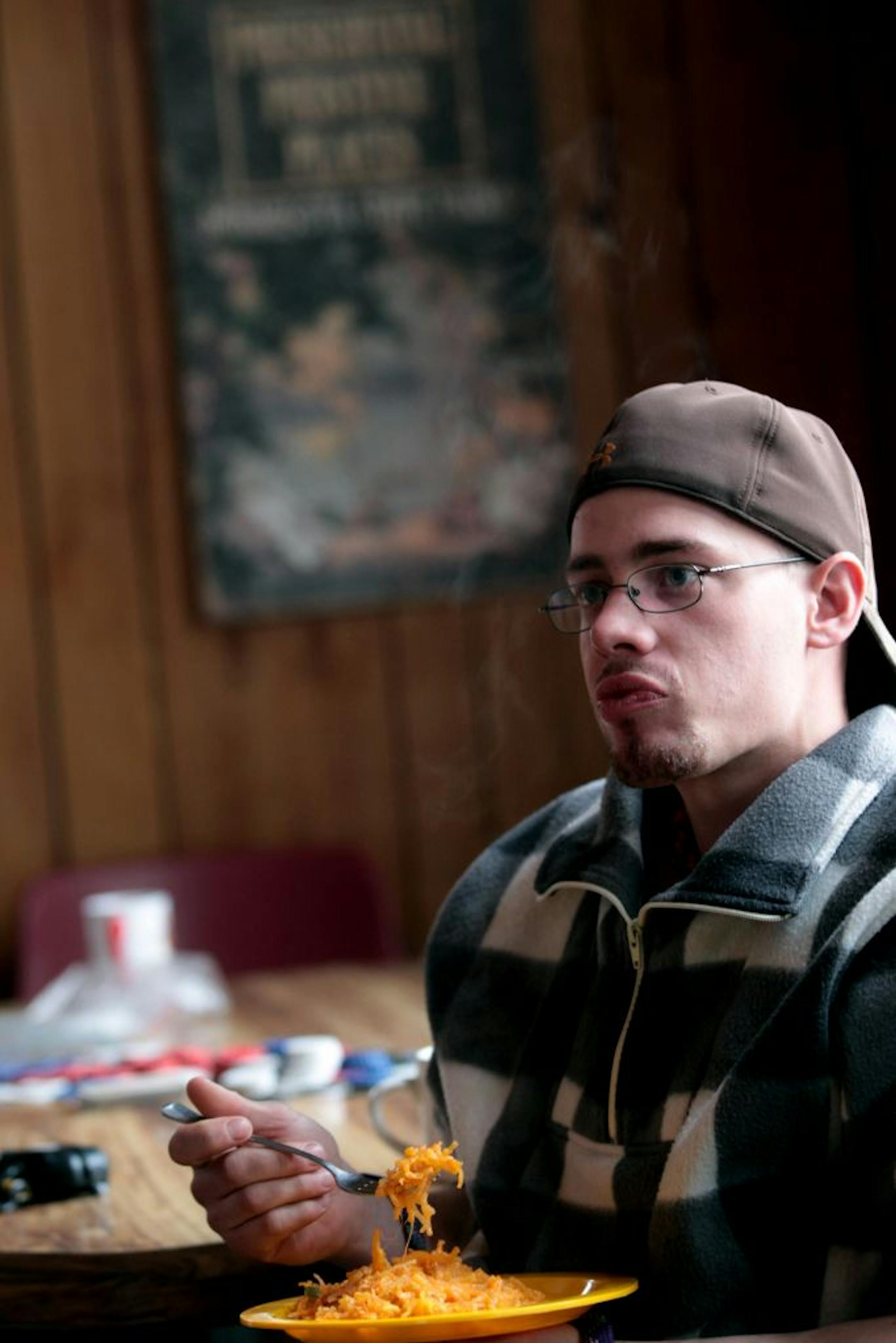 Joe Hoffmann enjoyed a hot breakfast with a group of students from St. Cloud State that was attending a leadership workshop at Wild River State Park, Thursday March, 8, 2012 in Center City, MN.