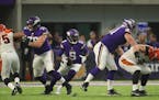 Vikings quarterback Teddy Bridgewater looked for a receiver before throwing his first pass - an interception - moments after returning to playing afte