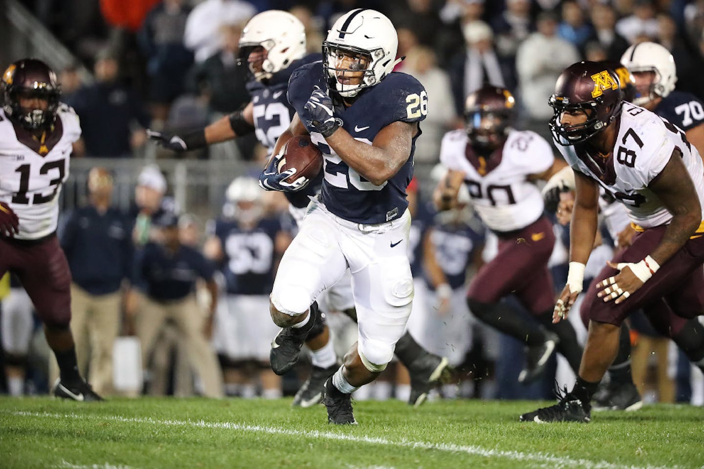 Penn State running back Saquon Barkley broke away from the Gophers defense on the Nittany Lions' first play from scrimmage in overtime for the game-winning touchdown Saturday.