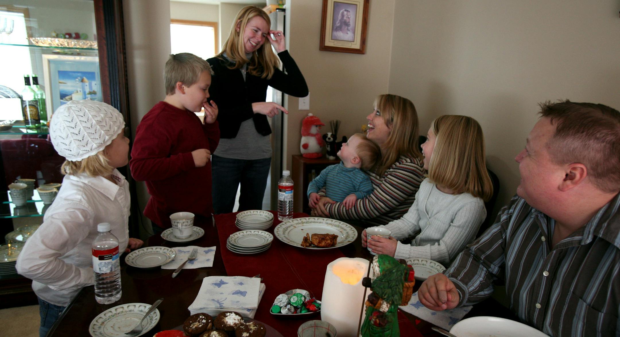 Jeff Postuma right, enjoyed cookies and cocoa with his family (left to right); Madison 6, Tyler 8 (two kids with Lori Hansen), Samara Postuma (current wife), Lori Hansen (former wife holding Jeff and Samara's 18-month-old son Henry, and Megan (the kids' cousin).