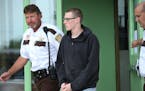 John LaDue, the would-be school shooter in Waseca, was escorted out of the Waseca County Cout House after he made an appearance in court for a hearing