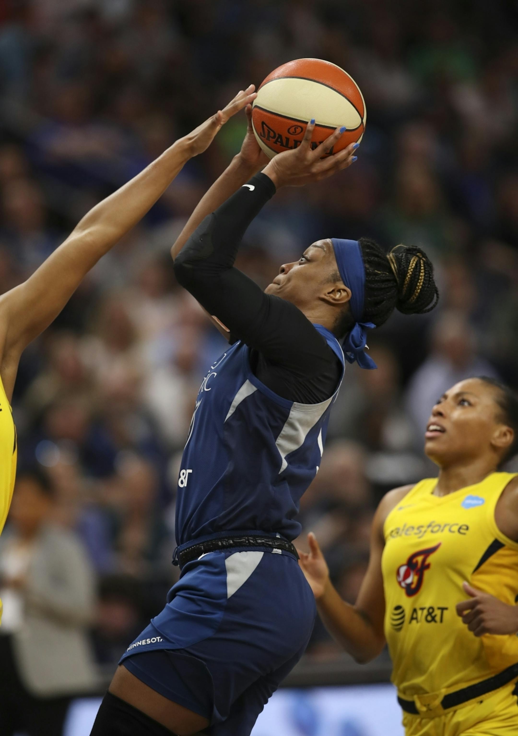 Minnesota Lynx guard Odyssey Sims (1) put up a fourth quarter shot. She led the Lynx with 17 points.