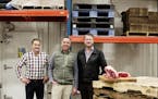 John Gibson (left), Mike Higgins and Tim McKee of The Fish Guys, which is launching Markethouse Meats to expand into offering cattle, chicken and pork