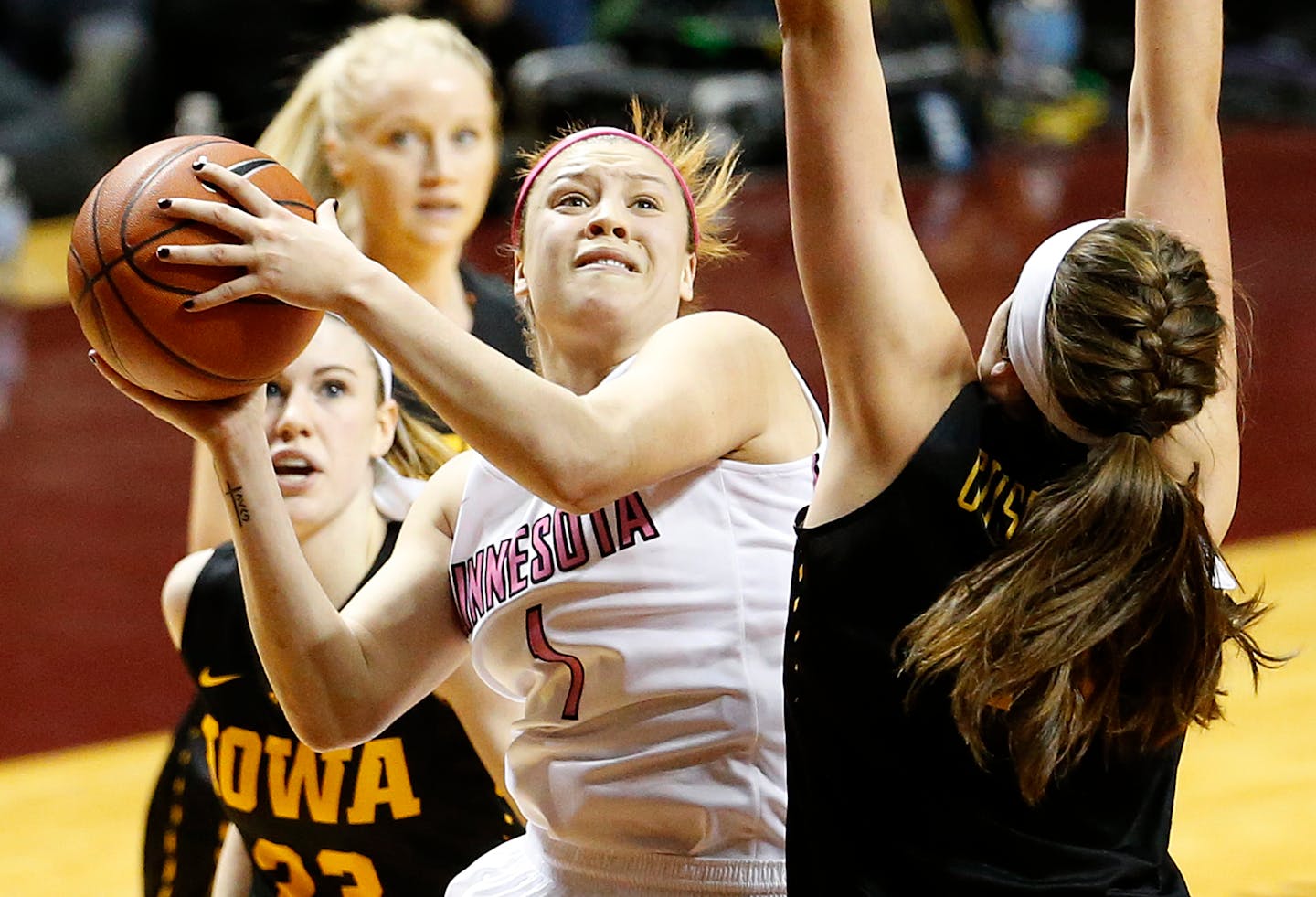 Gophers guard Rachel Banham attempted a shot in the second quarter Monday night. She later hit a game-winning three-pointer, lifting the Gophers over Iowa 78-76 at Williams Arena.