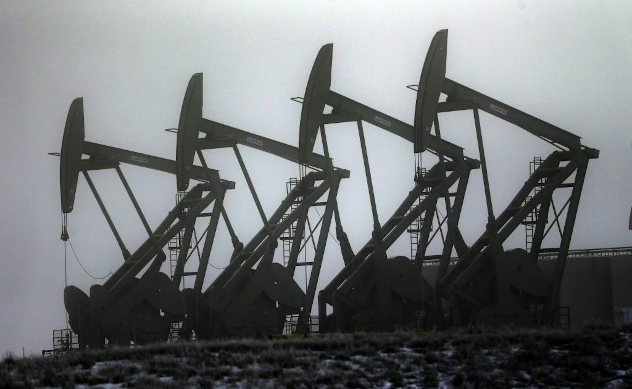 Oil pump jacks work in unison in Williston, N.D., where Mercy Medical Center delivered 882 babies in 2015 — up from 804 in 2014.