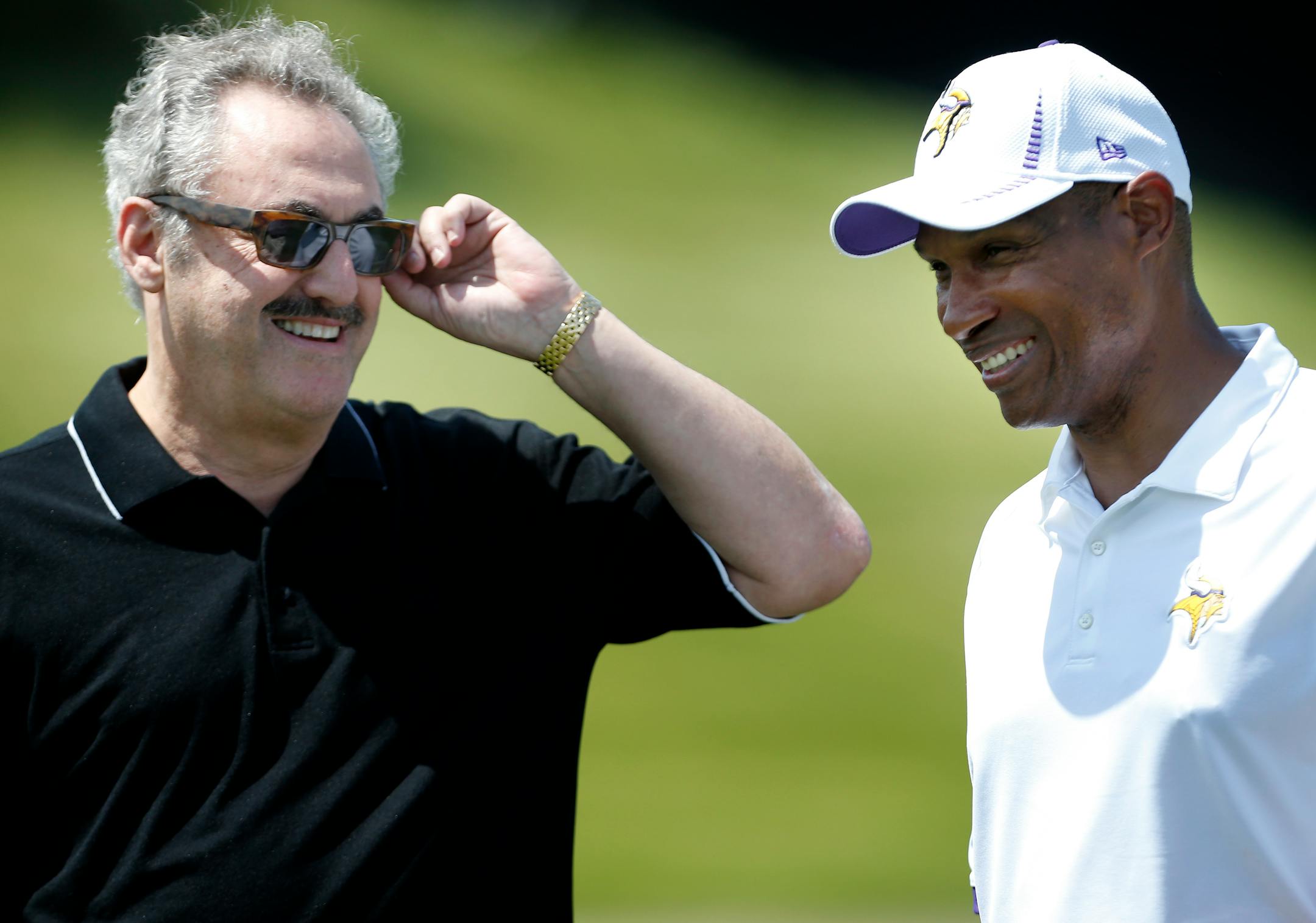Vikings owner Zygi Wilf and coach Leslie Frazier.