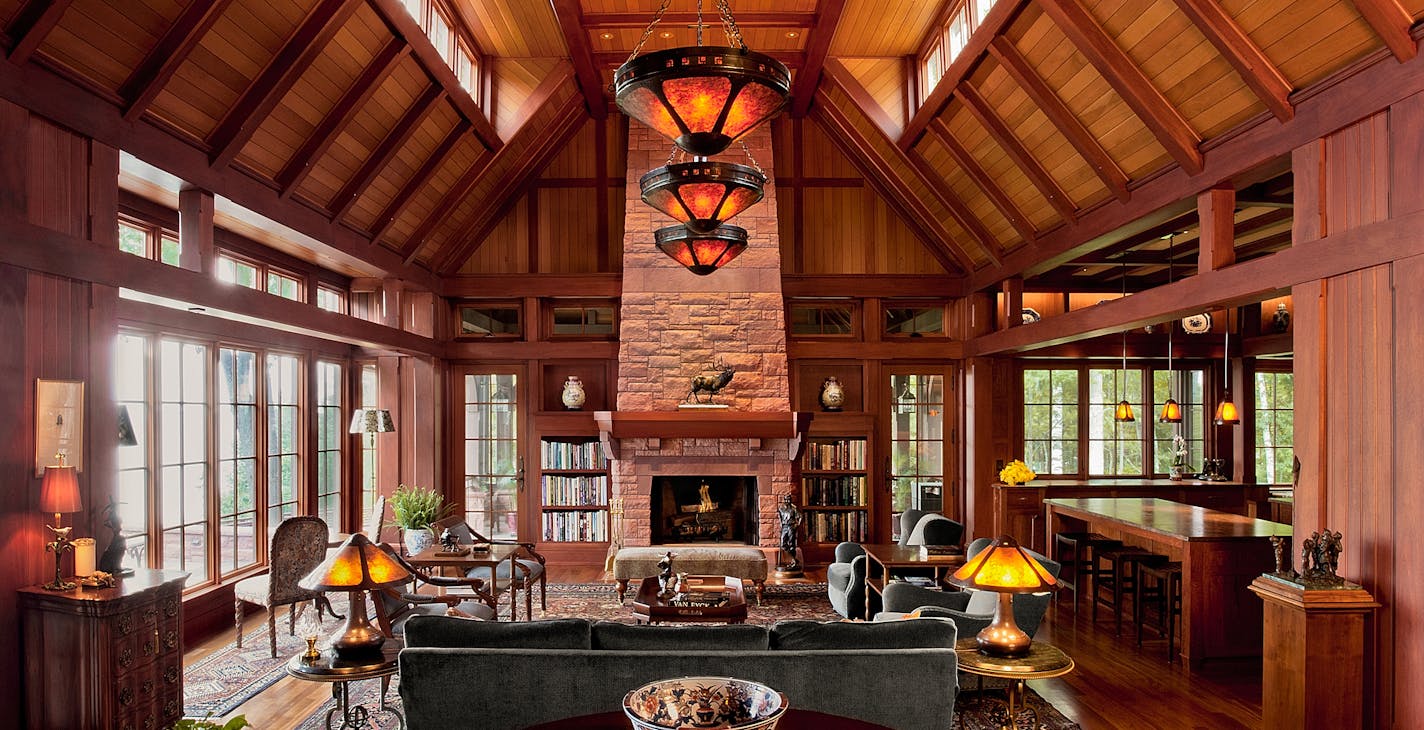 The great room is anchored by a Colorado Rose stone fireplace.