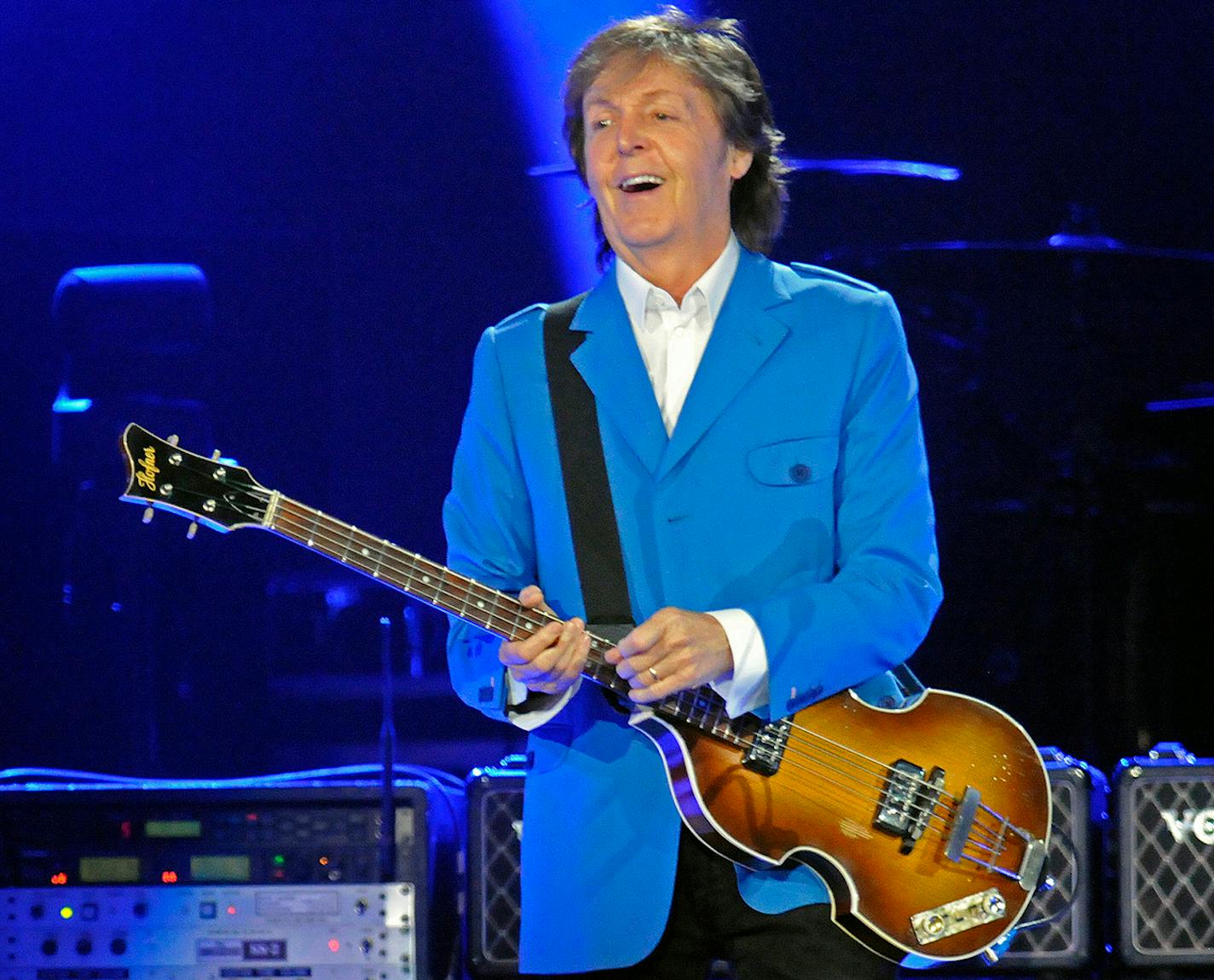 Sir Paul McCartney performs with his band during the "Out There" Tour at the Times Union Center on Saturday, July 5, 2014, in Albany, N.Y. (Photo by Hans Pennink/Invision/AP) ORG XMIT: NYHP119