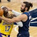 Dennis Schroder (17) of the Los Angeles Lakers was fouled by Minnesota Timberwolves Minnesota Timberwolves Ricky Rubio (9) in the fourth quarter.