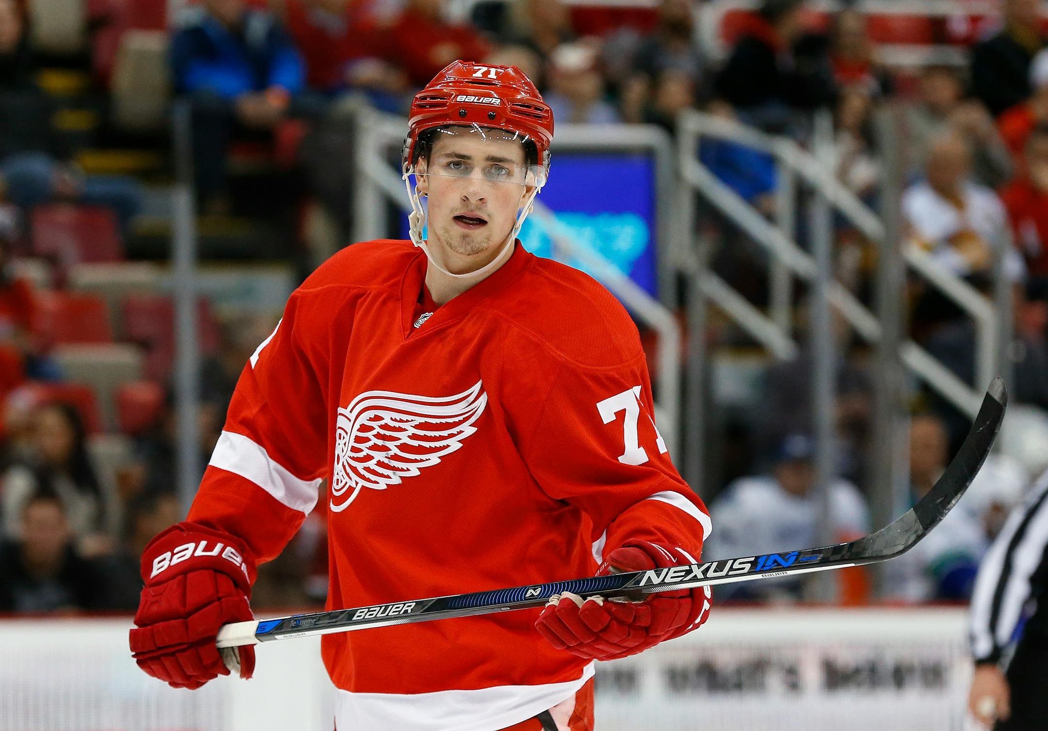 Detroit Red Wings center Dylan Larkin (71) plays against the Vancouver Canucks in the first period of an NHL hockey game Friday, Dec. 18, 2015 in Detroit. (AP Photo/Paul Sancya)