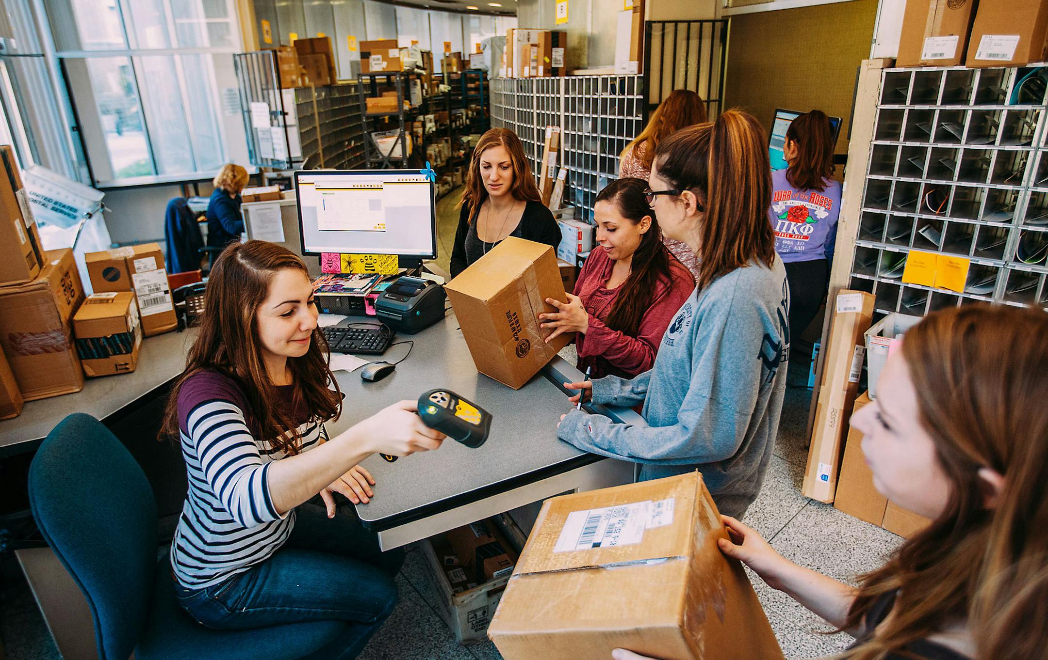 Rachel Sleisig, 21, a student mail clerk in the Towers Mail Center, scans a package as it arrives at Litchfield Towers at the University of Pittsburgh on Nov. 4, 2015. (Andrew Rush/Pittsburgh Post-Gazette/TNS) ORG XMIT: 1176739